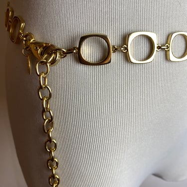 Vintage shiny gold chain link waist belt 1960’s vibes glossy cutout squares nice quality hip or waist belt size S-M open size 