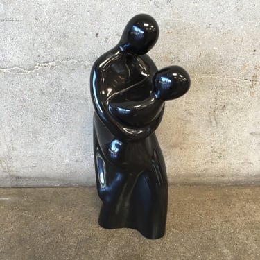 Vintage Black Ceramic Statue of a Man & Woman