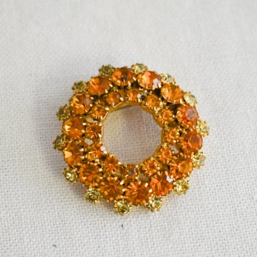 1960s Orange Rhinestone Circle Brooch 