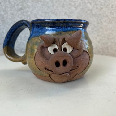 Vintage stoneware studio art pottery brown mug pig face blue glaze Holds 10 ozs 