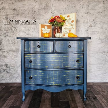 Four drawer serpentine teal dresser. Coffee bar. Entryway storage. 