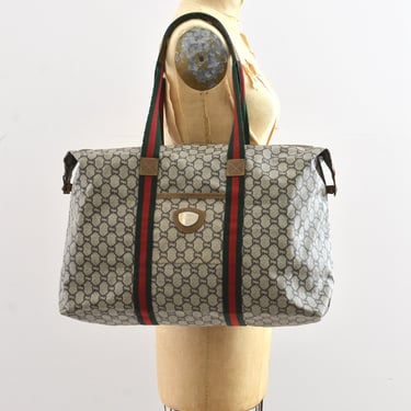 Gucci 1980s Navy Monogram Canvas and Leather Shoulder Bag – Featherstone  Vintage
