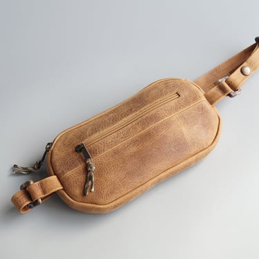 Ariana Castellanos: Brown Leather Banana Crossbody Bag
