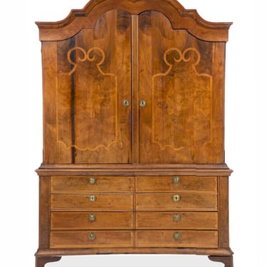 Large German Rococo walnut intarsia cupboard. Second half of the 18th century 