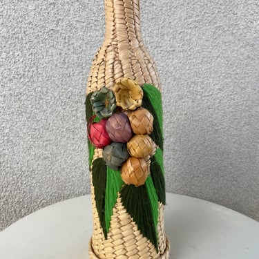Vintage boho Mexican straw wine bottle cover yarn accents size 14” x 4” 