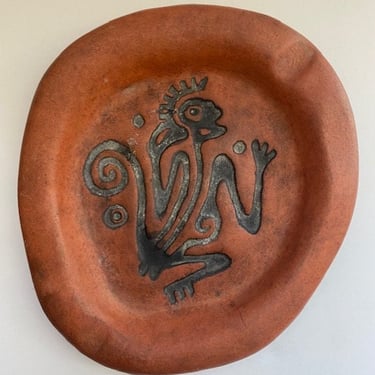 Vintage terra cotta tray with abstract monkey 