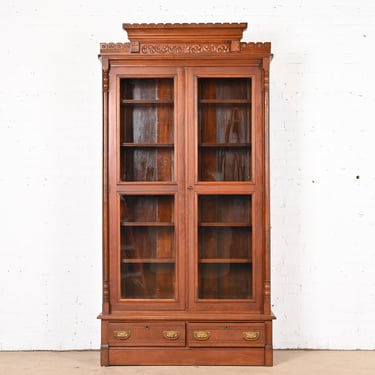 Herter Brothers Style Antique Eastlake Victorian Carved Walnut Bookcase, Circa 1880s