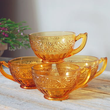 Vintage amber glass coffee cups / Indiana Glass daisy pattern #920 / four vintage amber pressed floral glass cups / amber glass tea cups 