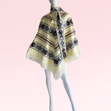 Vintage 1970s Guatemalan Ivory Fringe Hand Embroidered Woven Poncho - A Unique Piece of Ethnic Fashion 