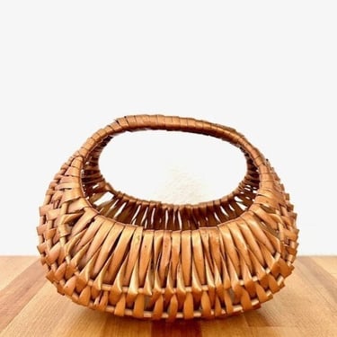 Small woven vintage basket with handle 