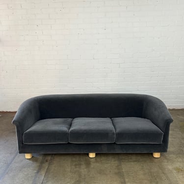Curved back mohair sofa on pine legs 