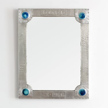 Liberty & Co. attributed, pewter mirror inset with Ruskin cabochons, England 1926.
