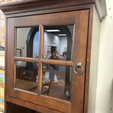 Cherry One Door Glass Front Cabinet with Shelves from Howard Miller Furniture