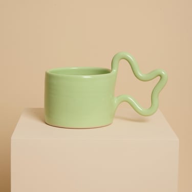 Green handmade ceramic mug with wiggle handle 