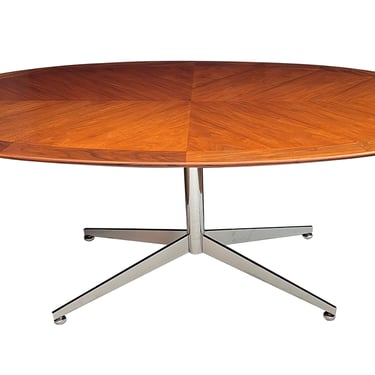 A Florence Knoll Walnut and Chrome Oval Dining Table by G.M. Proctor & Sons