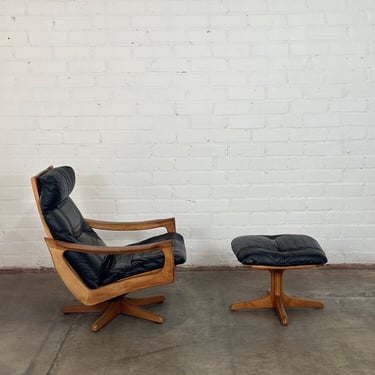 Leather reclining lounge chair and ottoman 