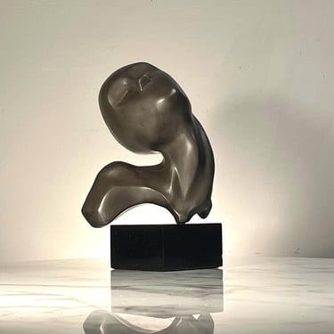 Signed bronze bust sculpture of an abstract woman 