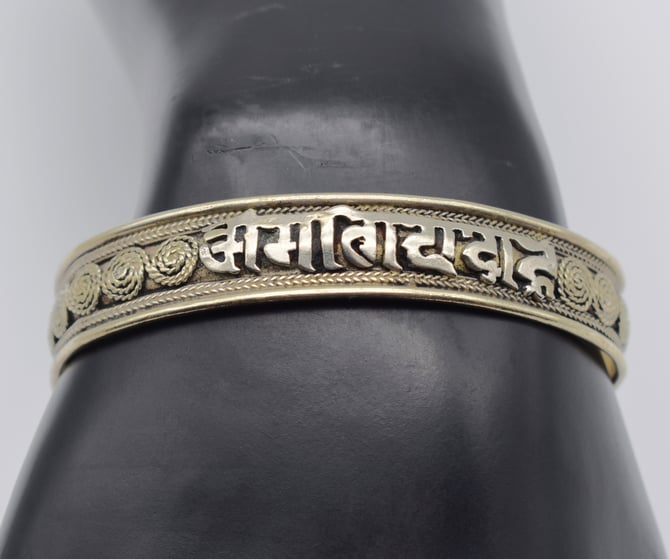 60's brass Tibetan silver Om Mani Padme Hum coiled rope Buddhist cuff, detailed Sanskrit compassion chant hippie bracelet 