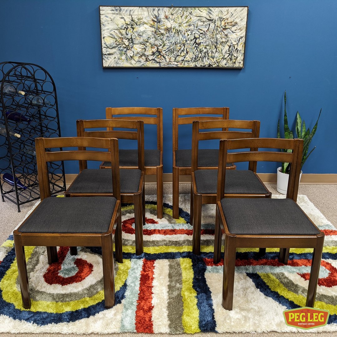 Set of 6 Danish Modern walnut dining chairs with new upholstery Peg
