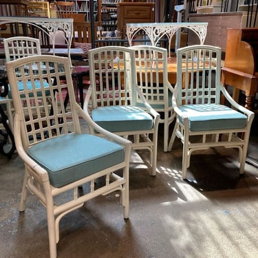 White rattan chairs.  6 available 21” x 18.5” x 37” seat height 19”