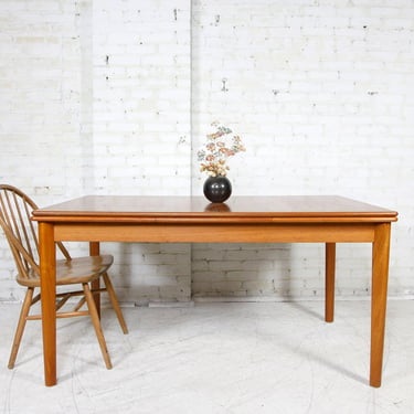 Vintage MCM Scandinavian teak wood dining table with extendable leaves (tapered legs) | Free delivery only in NYC and Hudson Valley areas 