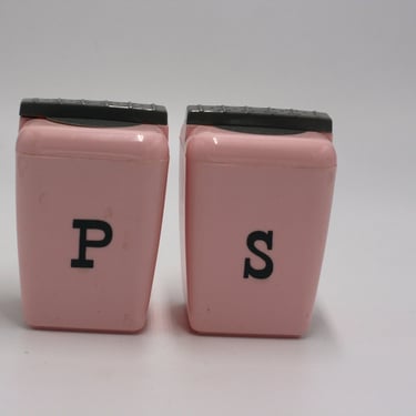 vintage mid century plastic salt and pepper shakers pink and gray 