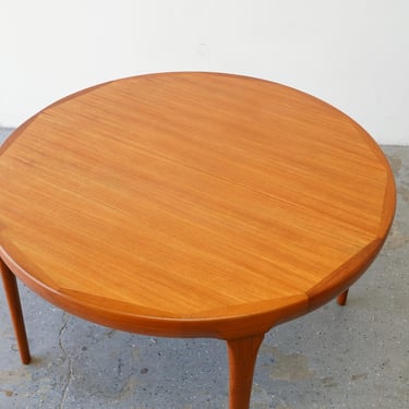 Teak Danish Modern Dining Table by Ib Kofod-Larsen for Faarup Møbelfabrik with Two Leaves 