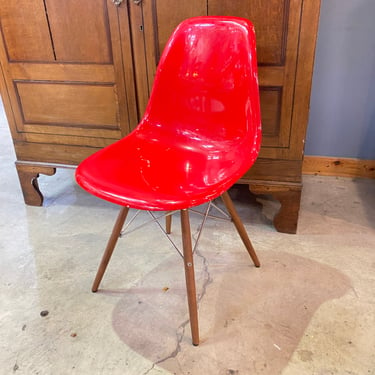 Red Plastic Chair with Splayed Wooden Legs