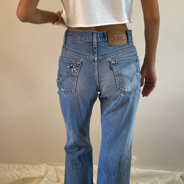 29 Levis 517 vintage faded jeans / vintage light wash torn knee hole worn in high waisted zipper fly boyfriend Levis 517 jeans USA | 29 
