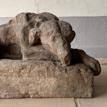 Reconstituted Stone Figure of a Recumbent Hound, England Circa 1920