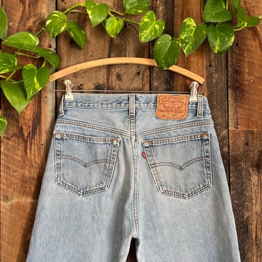 Vintage 80s Levi’s 501 USA Made medium Wash distressed size 30 waist 