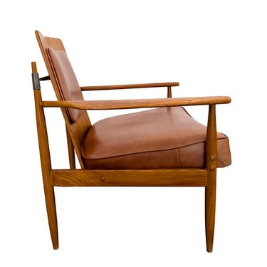 Open frame arm chair