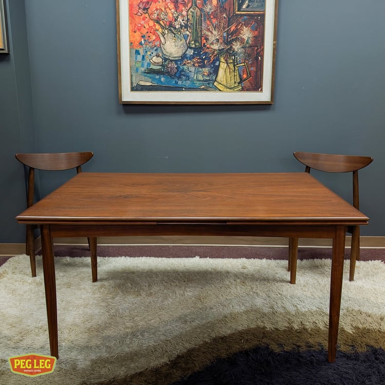 Danish Modern walnut draw-leaf dining table