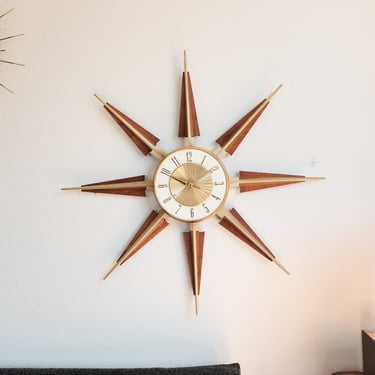 Vintage Mid Century Elgin Starburst Clock - Wood / Brass accented starbursts, brass / white clock face. 