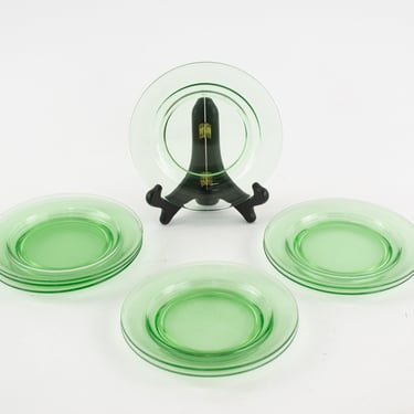 Set of Eight Uranium Glass Saucer Plates 
