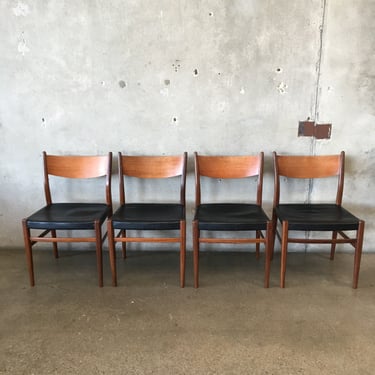 Set of Four Vintage Black Vinyl Teak Chairs
