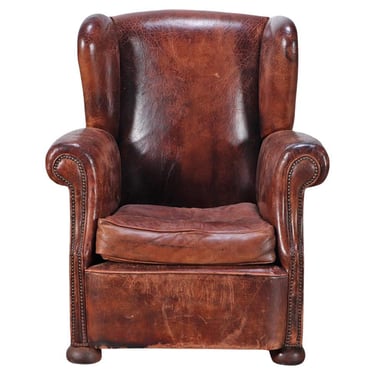 A Danish Leather Wing Chair, C. 1950.