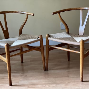 Two Original CH24 Wishbone Chairs in oak and new Danish paper cord, By Carl Hansen And Sons 