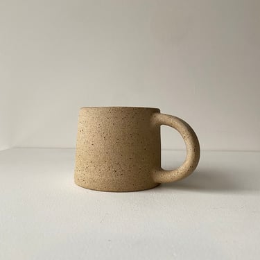 small sand toned handmade stoneware mug 