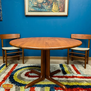 Danish Modern solid teak dining table