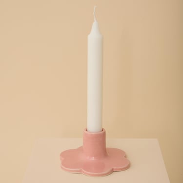 Pink handmade ceramic candle holder with scalloped edge 