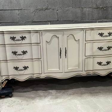1970’s faux French dresser. 20” deep x 72” long x 32” high. Very heavy. It has an extra $50 delivery fee! Lots of storage!! 