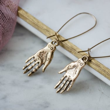 gold palmistry hand earrings, antique gold hand psychic medium celestial charm earrings, strange unique Halloween jewelry 