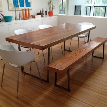 Modern Farmhouse Dining Table with 2.5" thick reclaimed wood top and square steel legs.  Choose size, height and finish. 