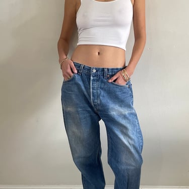 34 Levis 501 faded jeans / vintage baggy medium wash faded high waisted button fly slouchy boyfriend Levis 501 tall jeans | size 34 