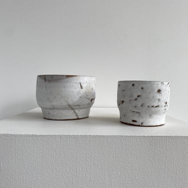 set of stackable handmade ceramic cups 