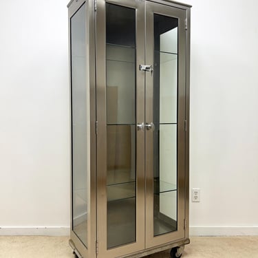 vintage mid century stainless steel glass medical cabinet tall large wheels industrial display apothecary 