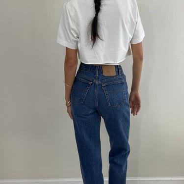 vintage Levis 501 button fly high waisted faded petite womens Levis jeans made in USA size 25 x 31