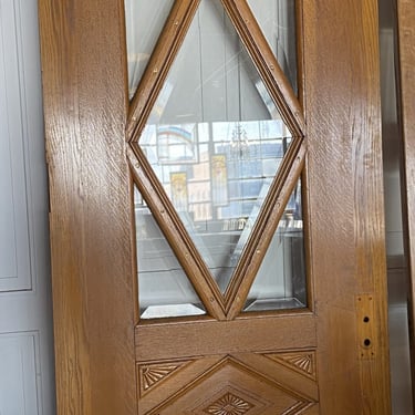 Exterior Door w Carved Accents and Bevel Glass Center