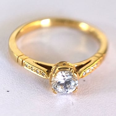 Yellow Gold Basket Solitaire Engagement Ring